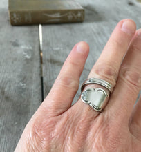 Mid century design spoon ring shown on model hand