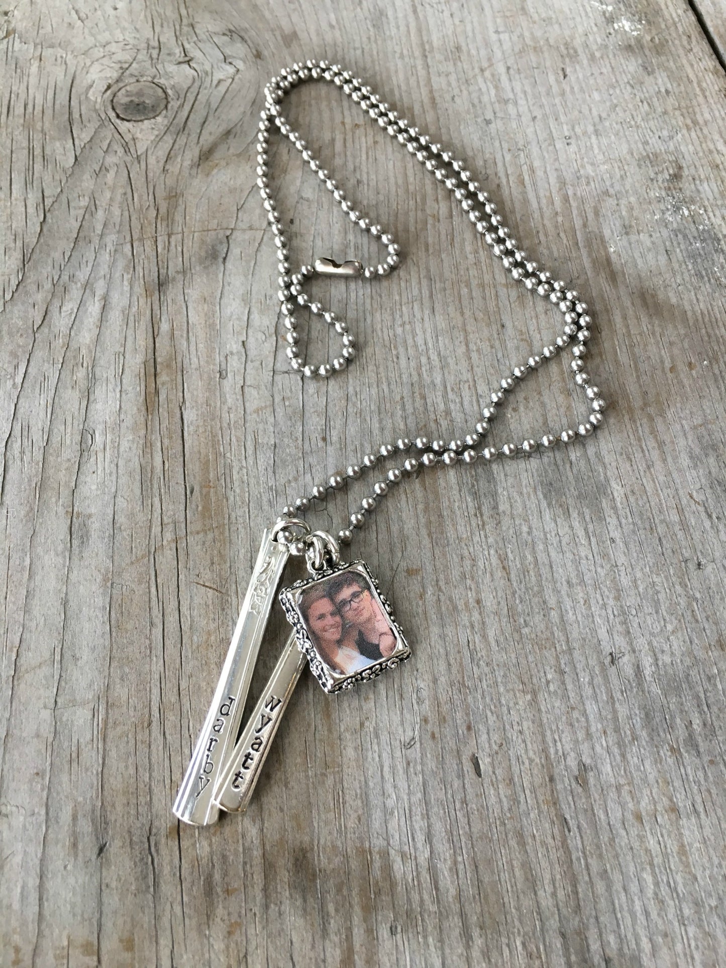 Close-up of hand-stamped silverplate spoon handle bars on Cherish Necklace, customizable personalized gift for mothers and grandmothers