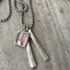 Personalized Cherish Necklace showing two hand-stamped upcycled silverware vertical bars with metal photo frame on stainless steel ball chain"