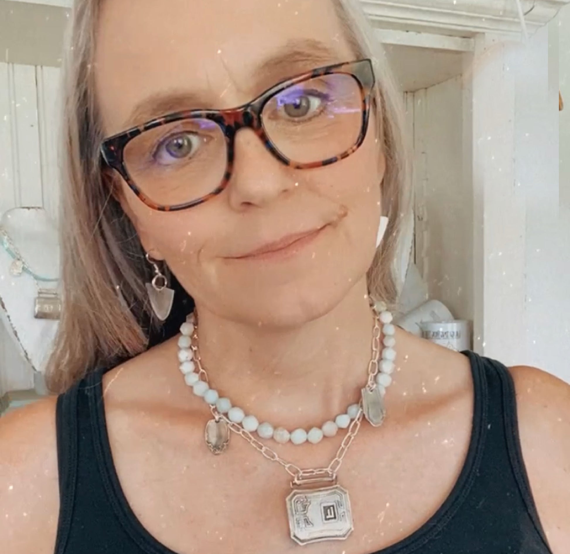 Upcycled 1920s belt buckle statement necklace with turquoise beads modeled - handcrafted vintage silverware artisan jewelry