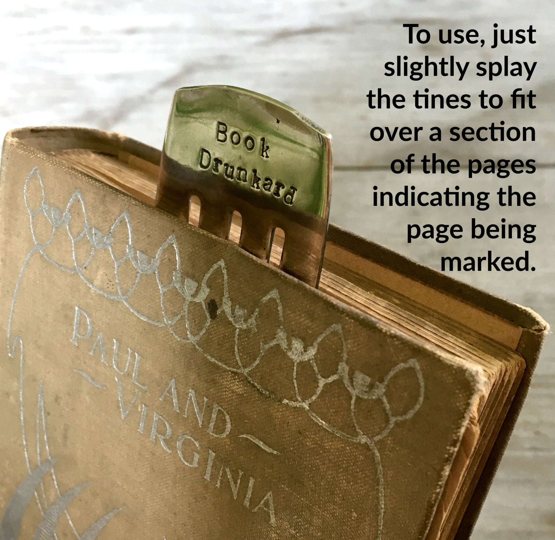 Fork bookmark usage instructions showing how to use vintage silverware bookmark in book