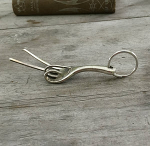 another view of Key chain upcycled from a fork into the shape of a hand give the peace sign hand gesture