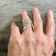 Size 7 fork ring shown on model hand
