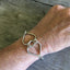 Fork Tine Heart Bracelet Shown on Model Arm