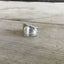 Close-up of monogram detail on Gorham Vine pattern sterling silver ring - Sterling spoon ring - handcrafted from upcycled vintage silverware - Laughing Frog Studio