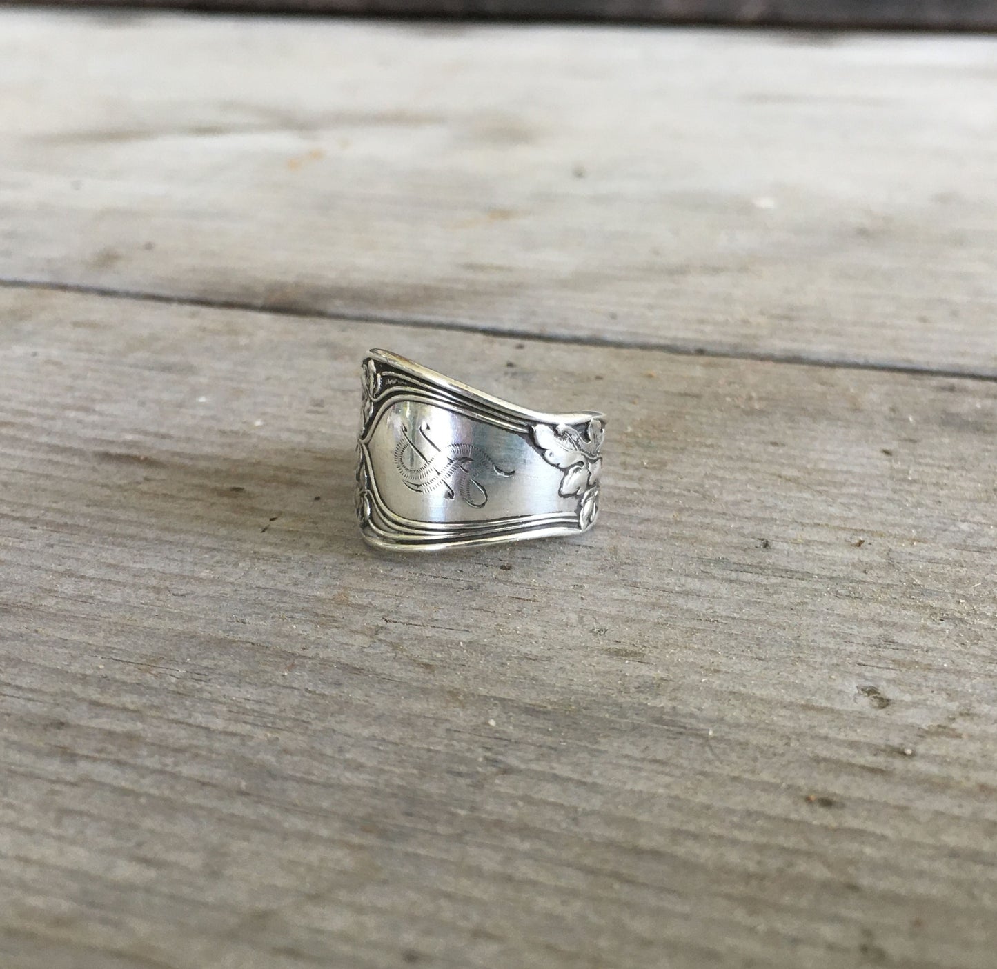 Close-up of monogram detail on Gorham Vine pattern sterling silver ring - Sterling spoon ring - handcrafted from upcycled vintage silverware - Laughing Frog Studio