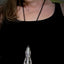 Long spoon handle necklace shown on model to illustrate length, size and scale