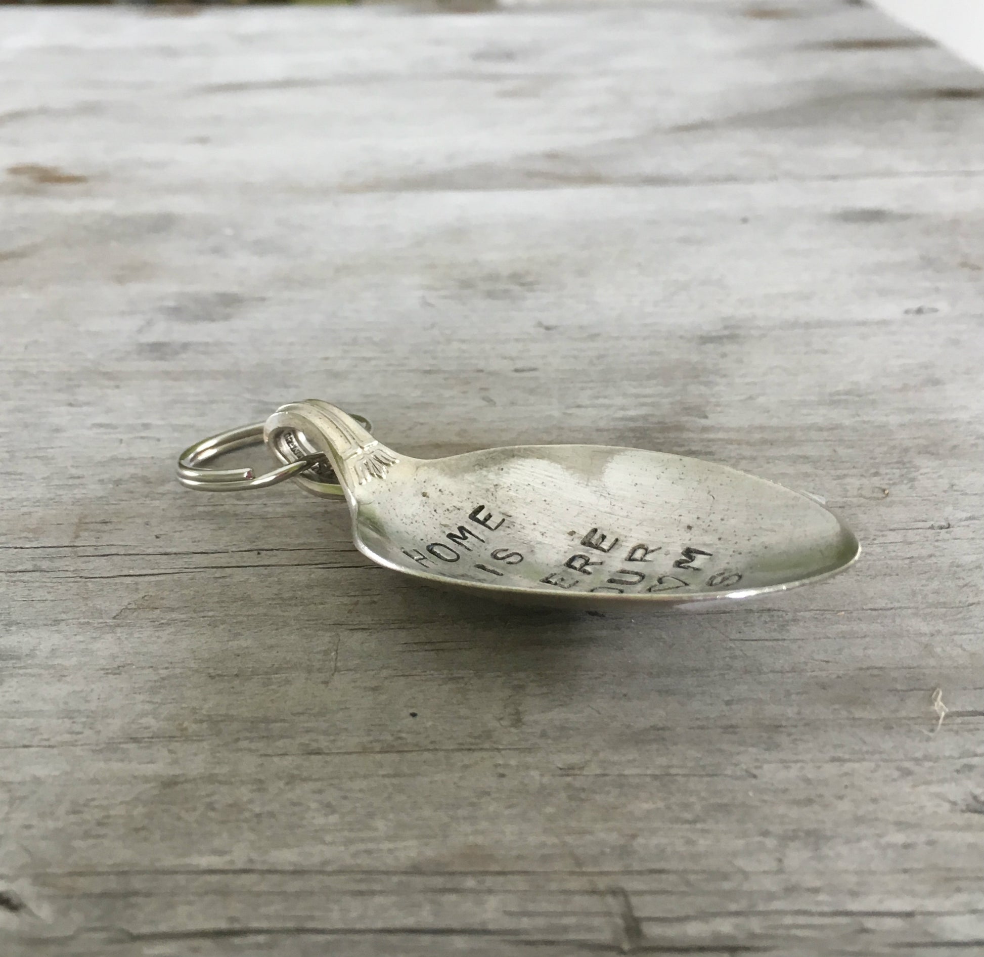 Side View of Spoon keychain hand stamped with HOME IS WHERE your mom is