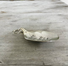 Side View of Spoon keychain hand stamped with HOME IS WHERE your mom is