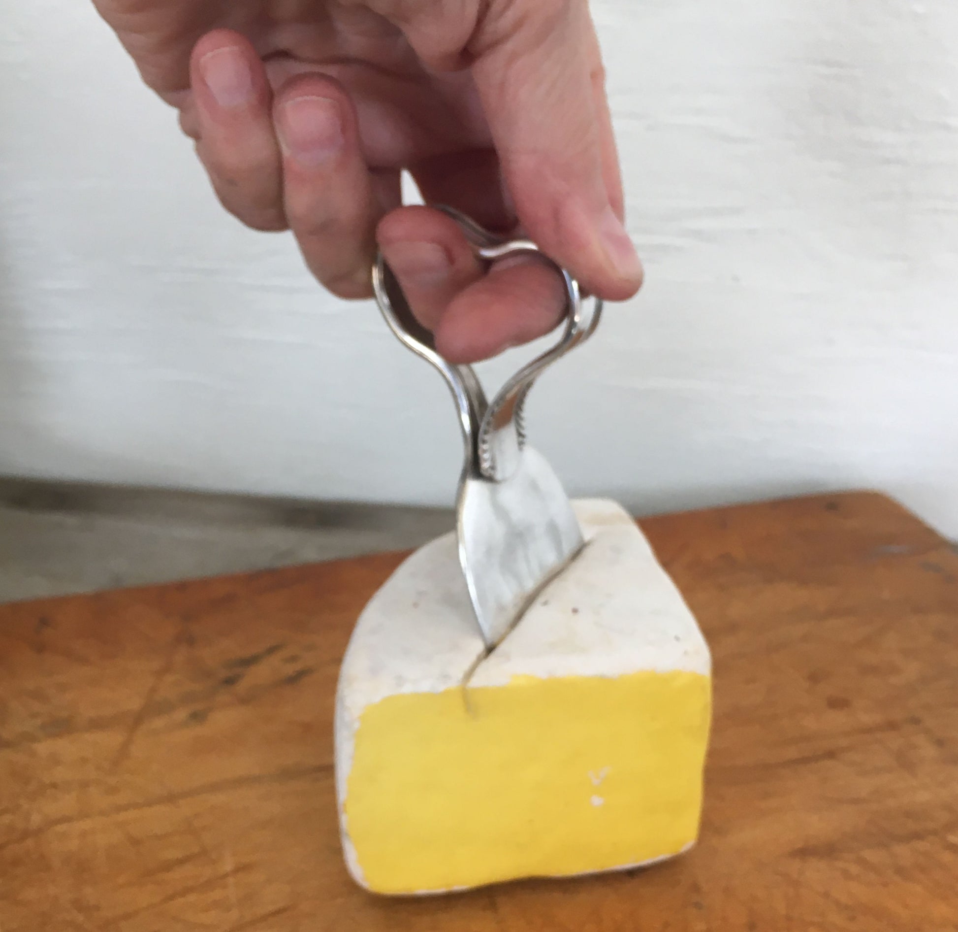 Showing the ergonomic design of our cheese knife