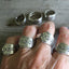 four Fortune pattern spoon rings shown on a hand - Spoon Ring - handcrafted from upcycled vintage silverware - Laughing Frog Studio
