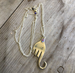 UPcycled silverware necklace in shape of an elephant with millefioiri bead