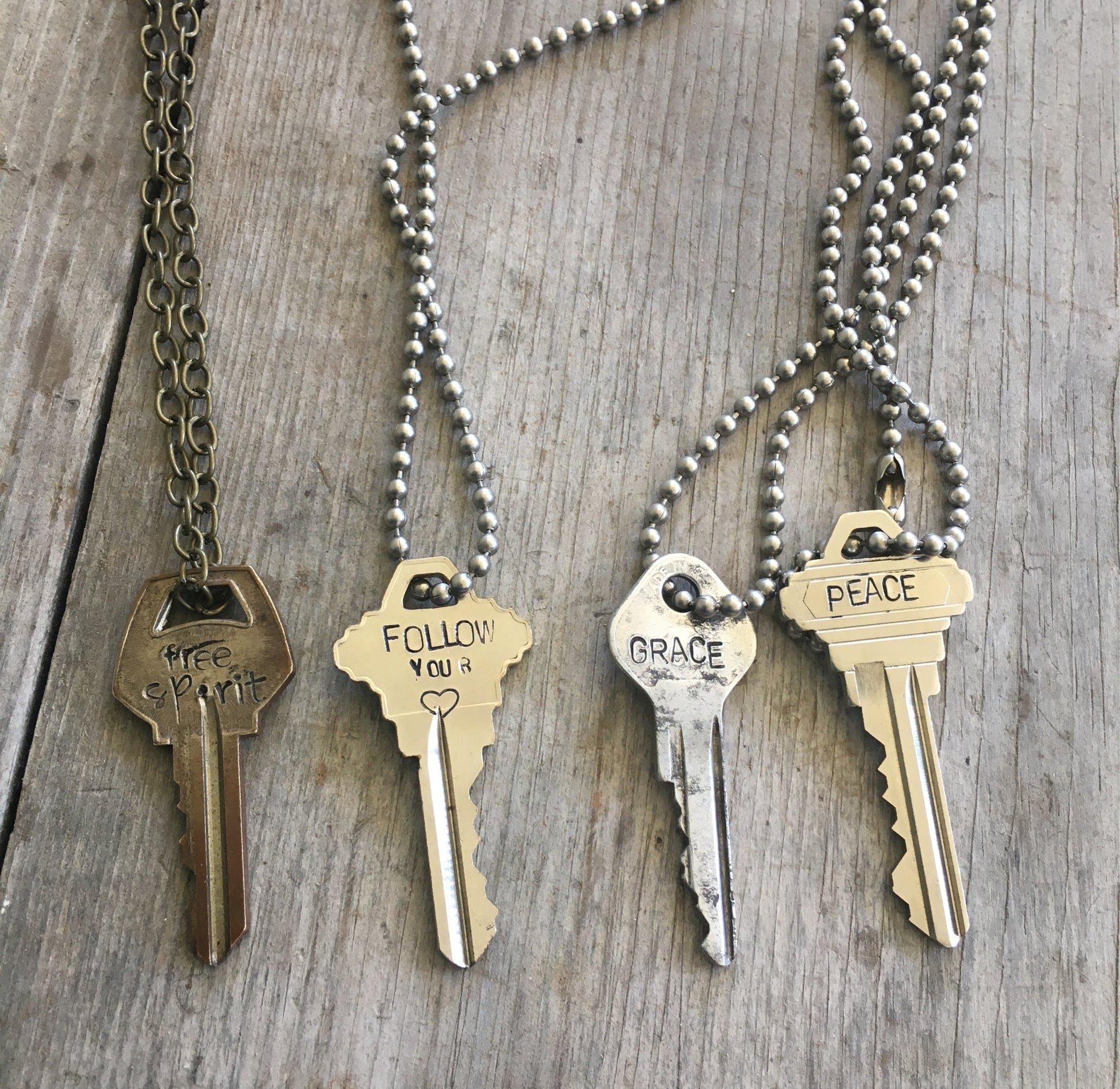 Four Hand Stamped Giving Key Necklaces