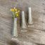 Handmade magnetic vase from antique Del Mar knife handle with fresh flowers 