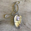 LOVE hand-stamped spoon necklace with heart stamp and pewter photo frame showing reclaimed vintage silverware, meaningful design