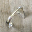 Hand Stamped Mermaid Soul Upcycled Silverware Spoon Cuff Bracelet shown on model wrist