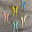 Collection of pinup girl cocktail fork earrings in various colors showing 1950s retro style options