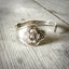 Detailed view of Reed and Barton Poppy pattern silverplate spoon cuff bracelet - handcrafted from upcycled vintage silverware - Laughing Frog Studio