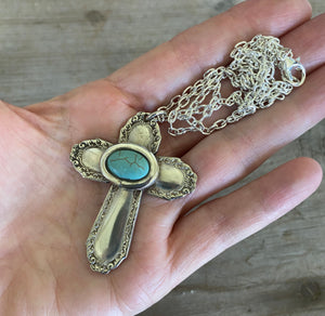 Handmade Cross Necklace Made from upcycled silverware handles  Shown In Hand for Scale