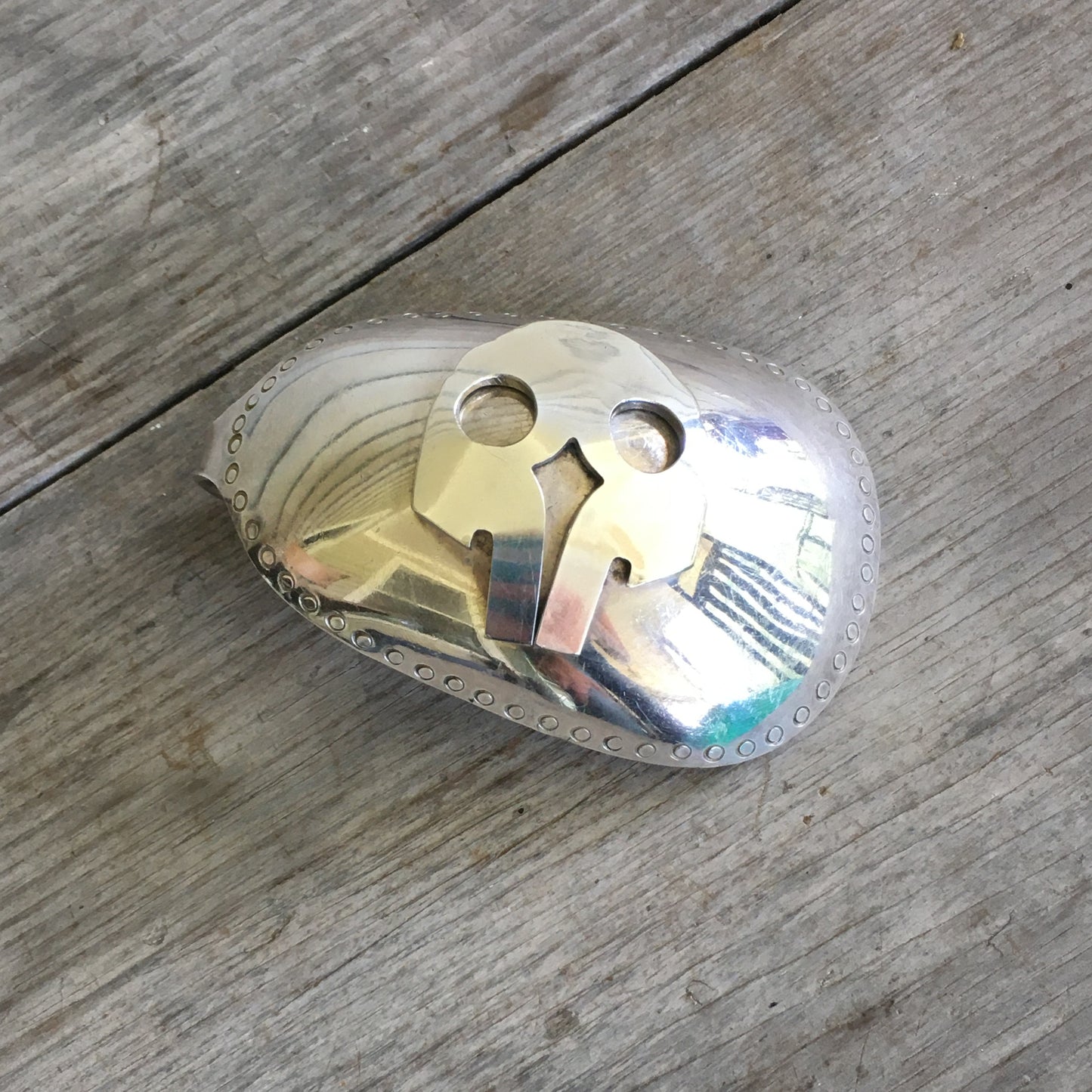 Spoon belt buckle with applied fork skull detail