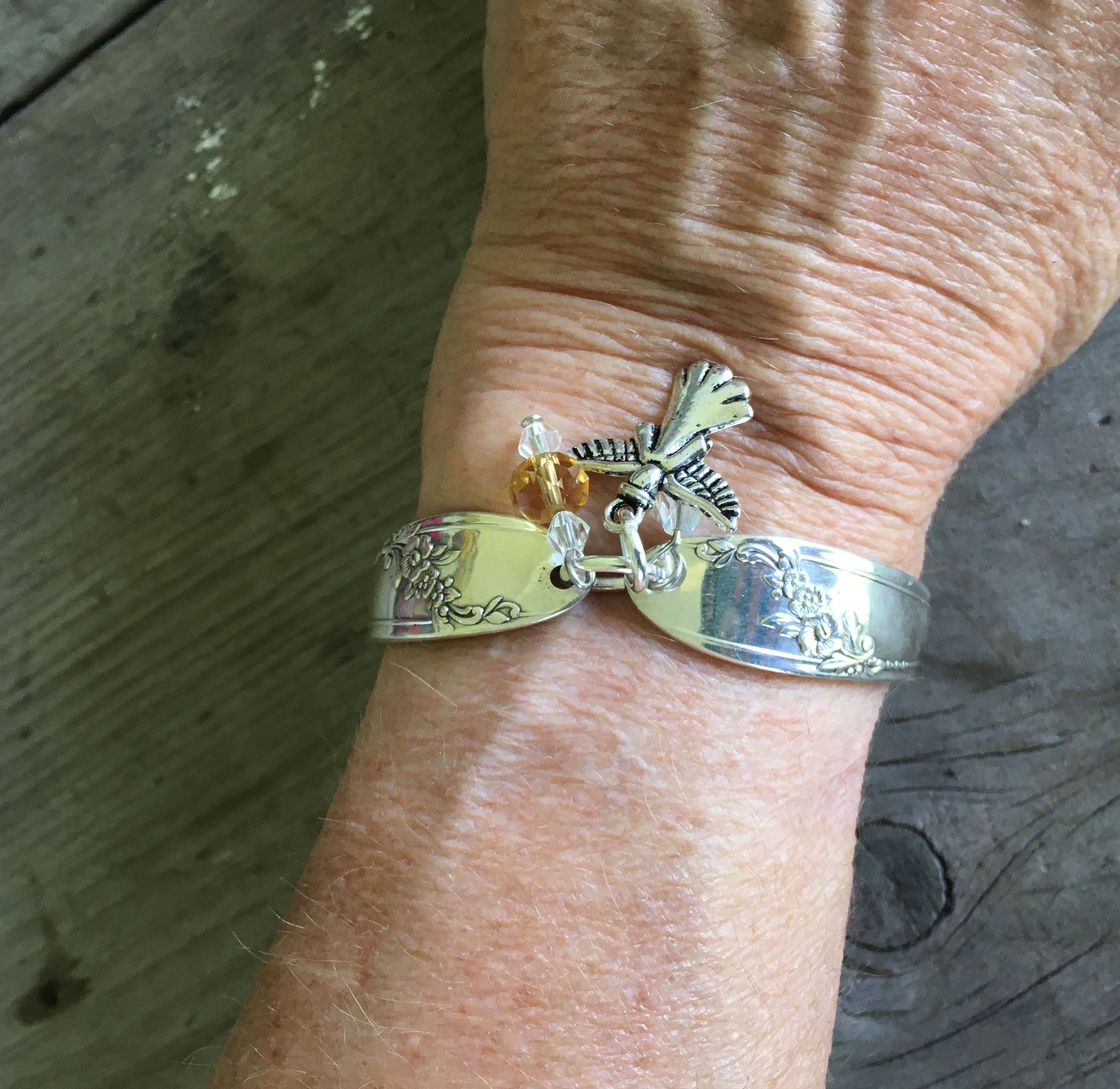 Spoon Bracelet with Angel Charm and Glass Beads shown on model