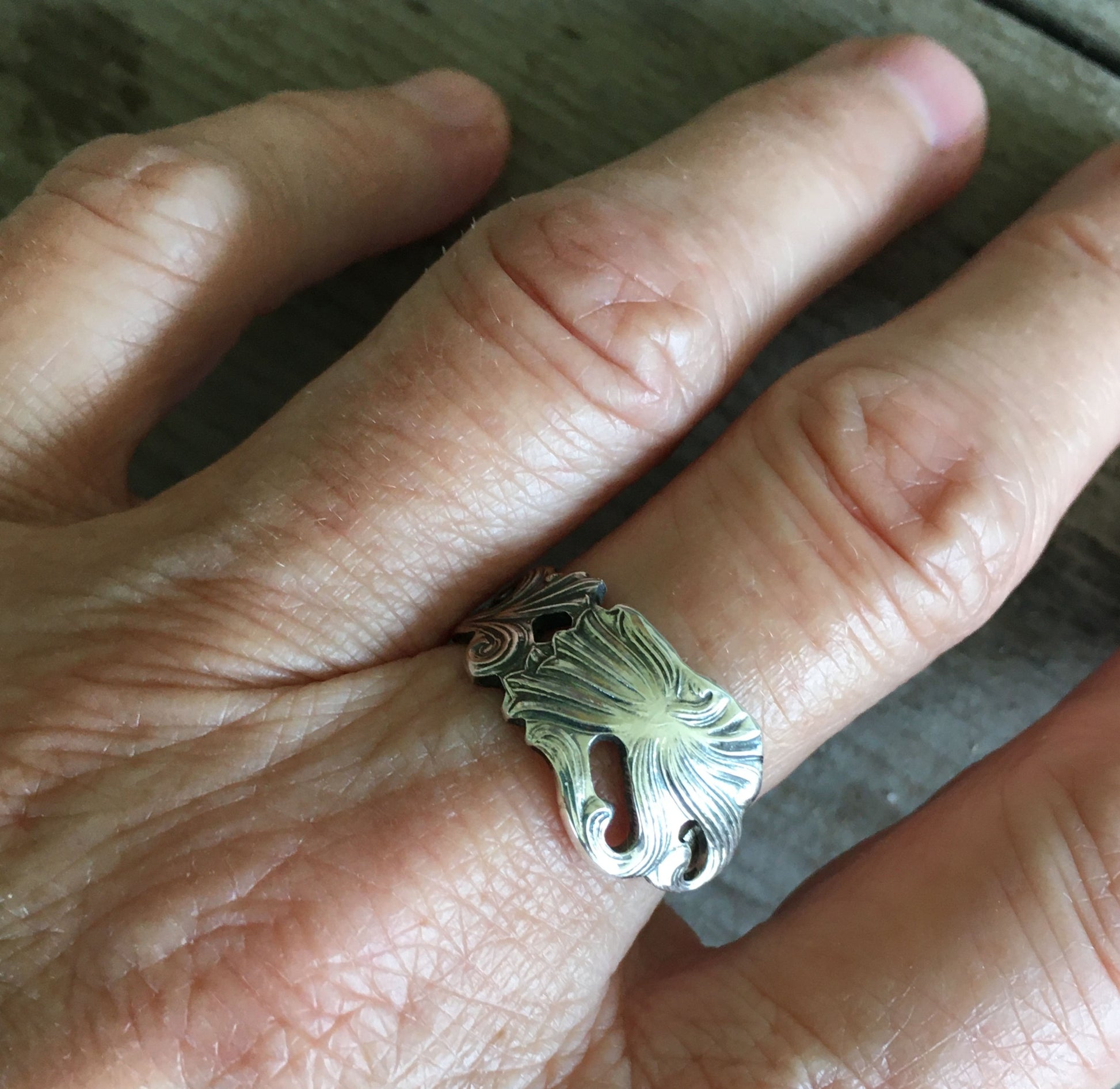 SWEDEN spoon ring worn on finger displaying size and fit of upcycled silverware ring