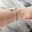 Stamped Spoon Bracelet Shown On Model Wrist