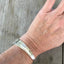 Stamped spoon cuff bracelet shown on model