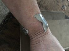 Mermaid Soul Cuff bracelet shown on model wrist 