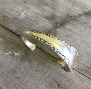 Top Down View of Handmade Spoon Cuff Bracelet from upcycled antique spoon