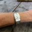 Wild heart cuff bracelet made from upcycled spoon shown on model wrist