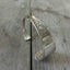 Rogers and Brothers Westminster pattern spoon cuff bracelet standing upright showing Victorian detail - handcrafted from upcycled vintage silverware - Laughing Frog Studio