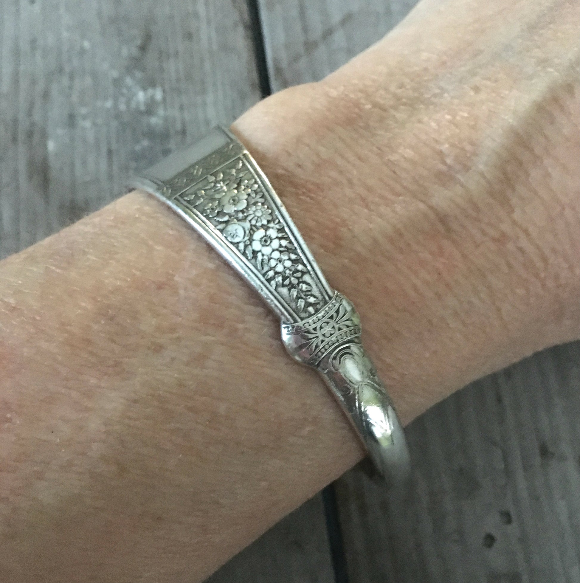 Rogers and Brothers Westminster silverplate spoon cuff bracelet worn on wrist - handcrafted from upcycled vintage silverware - Laughing Frog Studio