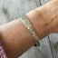 Floral Upcycled spoon bracelet size 6 shown on model