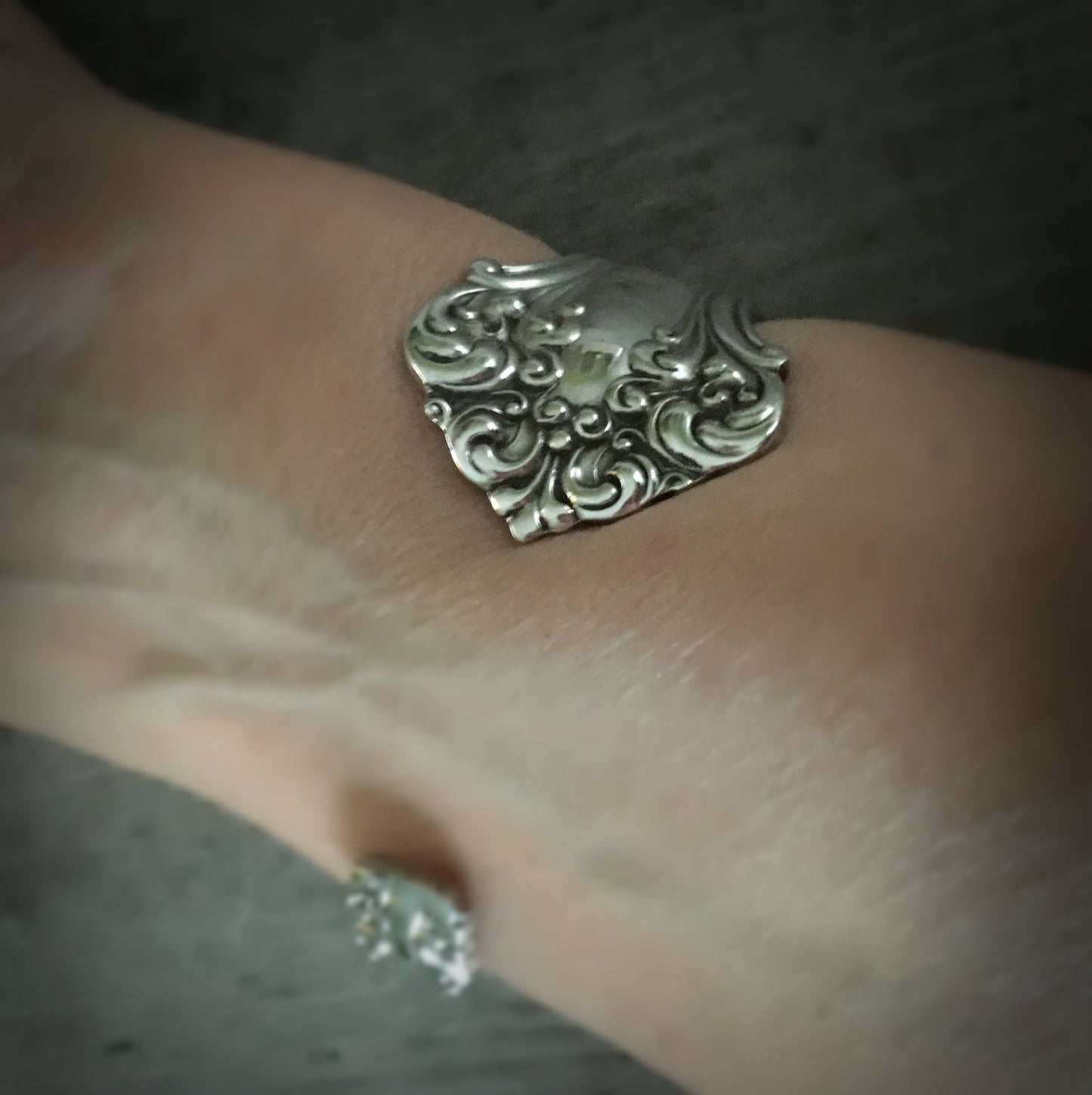 1847 Rogers Avon Spoon made into a cuff bracelet shown on model's arm from the bottom