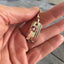 Spoon Earrings King Arthur Shown in Hand for Size Scale