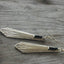 Side view of Art Deco silverware handle earrings