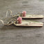 Side view of Spoon Handle Earrings Inheritance Pink Beads
