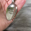 Home Sweet Home Keychain upcycled from vintage spoon shown in hand for size and scale