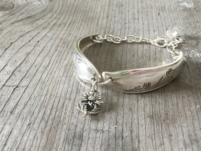 Silverware bracelet from upcycled spoon handles in the springtime pattern