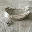 Spoon Bracelet Linked together with jump ring adorned with flower charm