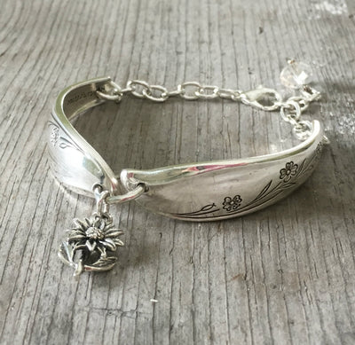 Spoon Bracelet Linked together with jump ring adorned with flower charm