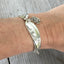 Spoon Link Bracelet shown on model wrist for size and scale