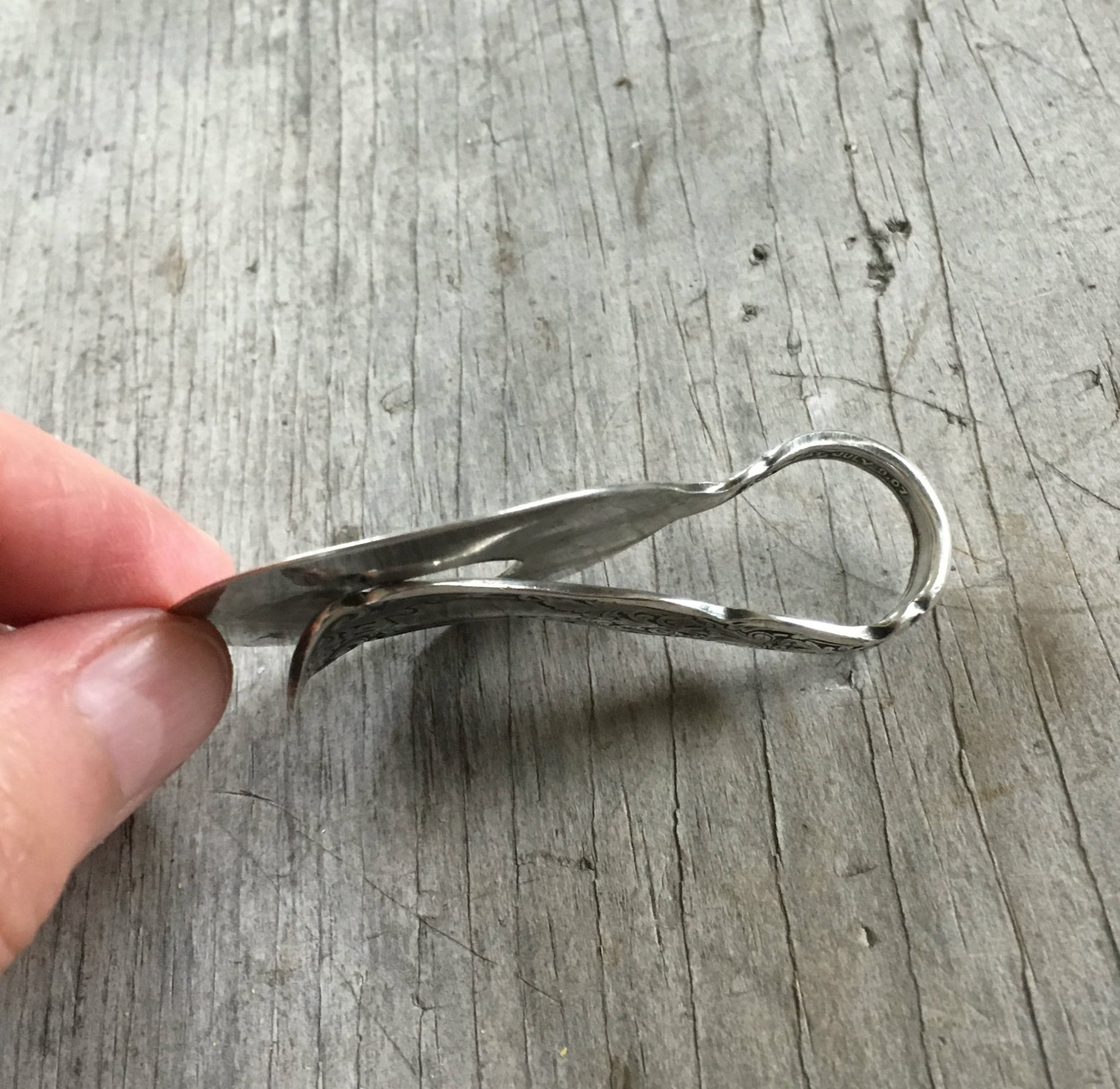 Side view of spoon money clip curve perfect size for pocket