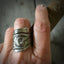 Peace Lily Upcycled Spoon Ring in Coil Wrap Style Shown on Model