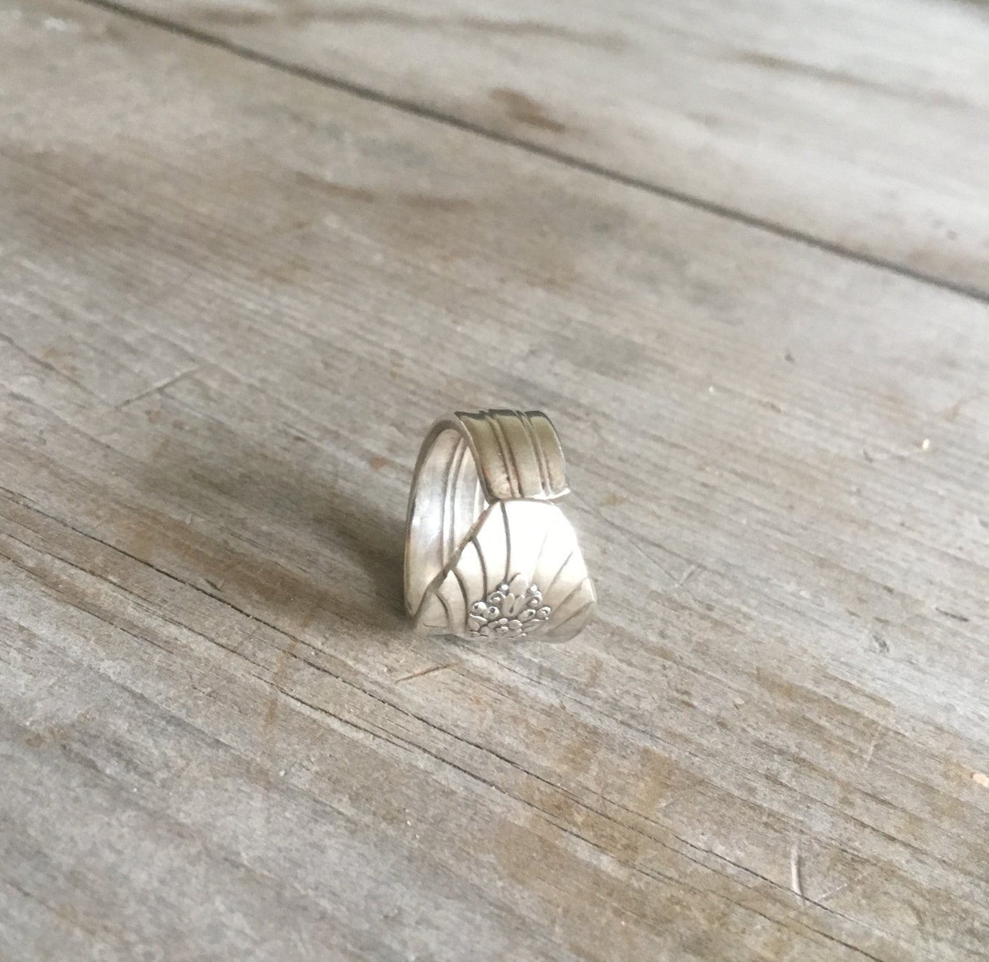 Detail of linear design and Art Deco elements on upcycled Imperial spoon ring