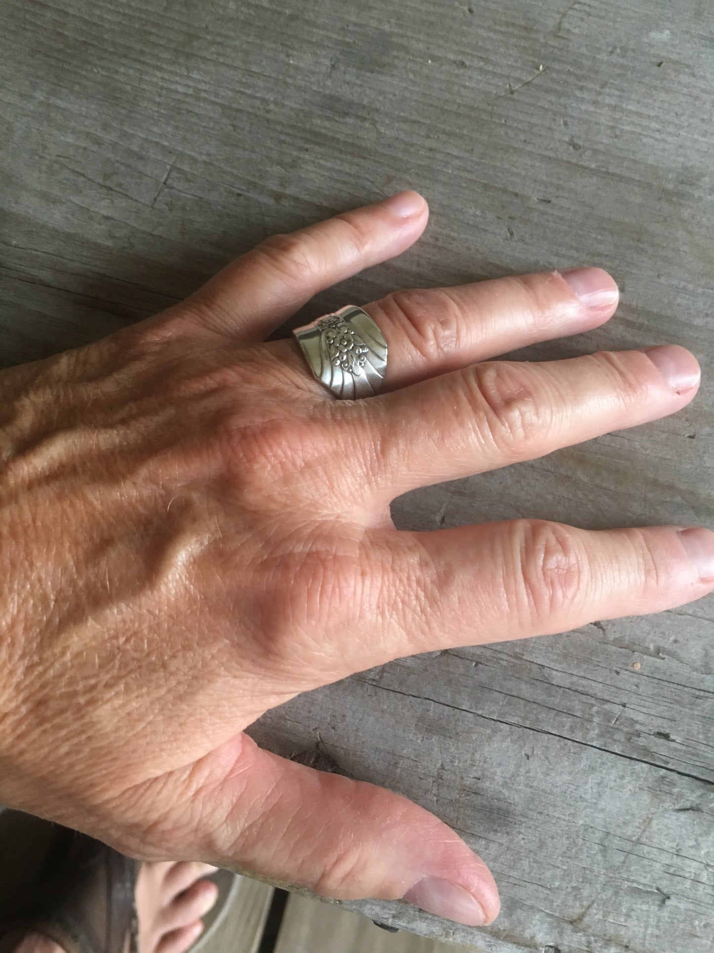 Imperial Art Deco spoon ring shown on hand - handcrafted vintage silverware jewelry