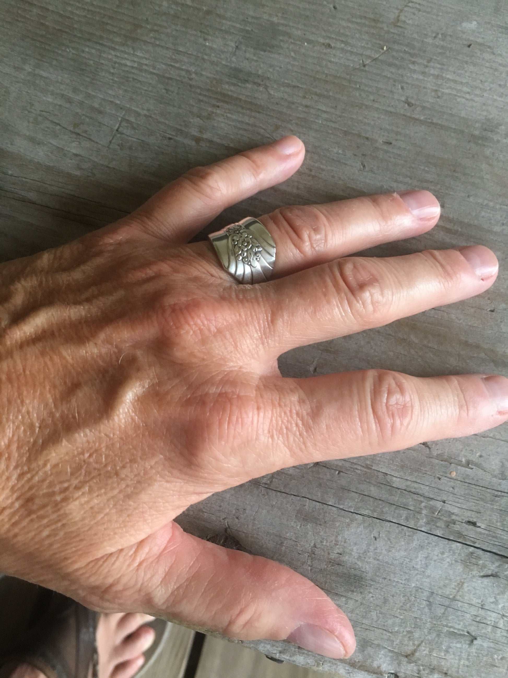 Imperial Art Deco spoon ring shown on hand - handcrafted vintage silverware jewelry