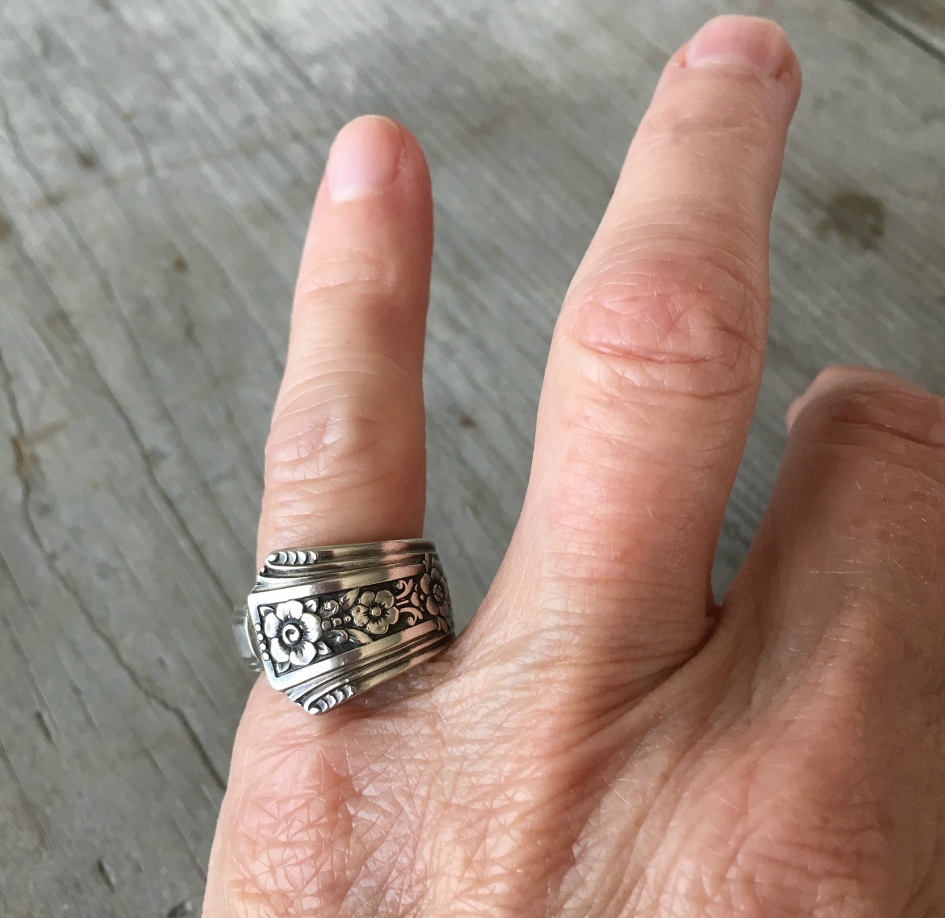Fortune pattern spoon ring shown on model- Spoon Ring - handcrafted from upcycled vintage silverware - Laughing Frog Studio