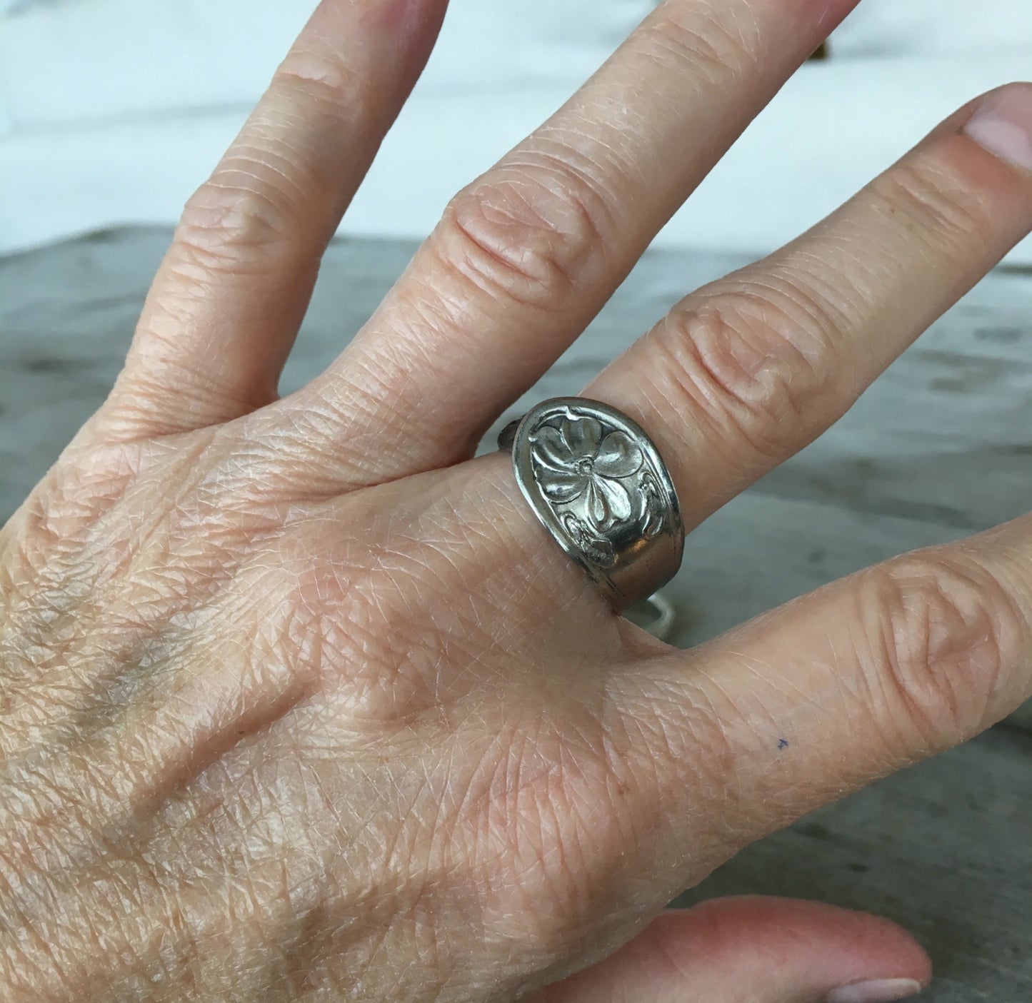 Spoon ring size 10 shown on model's hand